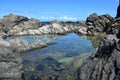 Serene Secret Hidden Pool Among Lava Rocks Royalty Free Stock Photo