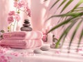 Serene spa environment with soft pink towels, candles and exotic flowers Royalty Free Stock Photo