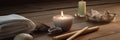 Serene Spa Scene: Massage Table Close-up, Natural Elements, Essential Oils & Waterfall