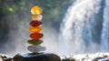 Stacked Sea Glass in Front of a Waterfall in a Nature Setting Royalty Free Stock Photo