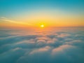 Serene Sunrise Above the Clouds Royalty Free Stock Photo