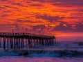 Sunrise over fishing pier at North Carolina Outer Banks Royalty Free Stock Photo