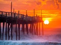 Sunrise over fishing pier at North Carolina Outer Banks Royalty Free Stock Photo