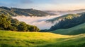 Serene Sunrise over Rolling Green Hills and Misty Valley Royalty Free Stock Photo