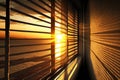 serene sunrise, with rays of sun shining through cracks in the window blinds