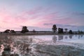 Serene sunrise on wild lake