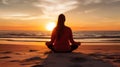 Meditating Woman At Sunset Beach: Dark Red And Light Orange Toning Technique Royalty Free Stock Photo