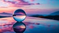 A serene sunset over mountains, reflected in a crystal ball and water, with vibrant hues