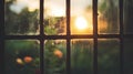 Serene Sunset Through a Rustic Window with Glass Reflections Royalty Free Stock Photo