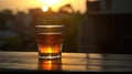 Serene Sunset Tea Time , Glass on Wooden Bench with City Silhouette