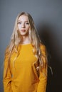 Serene teenage girl with very long blond hair Royalty Free Stock Photo