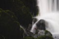 Serene and tranquil scene of a small waterfall Royalty Free Stock Photo