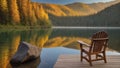 A serene view of Lake Alice with a wooden chair over the dock Royalty Free Stock Photo