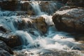 Serene Waterfall Cascading Over Rocky Terrain