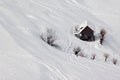 Serene winter landscape and a small cottage