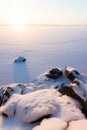 Serene winter morning view to frozen lake