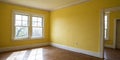 Empty corner yellow room with light from window Royalty Free Stock Photo