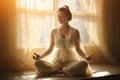 Serene Young Woman Engaged in Relaxation Yoga Practice at Home by the Bright Window