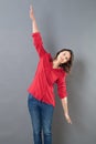 Serene young woman using her arms open wide to fly Royalty Free Stock Photo