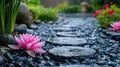 Serene Zen Garden with Black Stones and Pink Waterlily Royalty Free Stock Photo