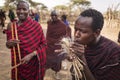 Serengeti National Park, Tanzania on 3rd June 2019. Group of masai people demonstrating how fire are made in the wild