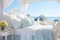 Serenity and chaos unite. bedroom retreat with rumpled white bedding and breathtaking ocean view