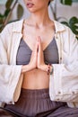 Serenity And Mindfulness Concept. Portrait of cropped european female holding hands together