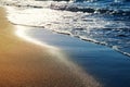 Serenity sand beach with waves. Sunny sea shore Royalty Free Stock Photo