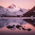 Serenity at Sunset: Alpine Lake and Snow-Capped Peaks