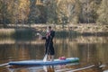 serfer in a bathrobe on a board, surfer on vacation