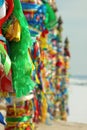 Serge. Sacred poles with colored ribbons in island Olkhon. Burkhan, Lake Baikal