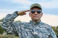 Sergeant in sunglasses saluting portrait. Royalty Free Stock Photo