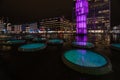 Sergels Torg surrounded by buildings and lights at night in Stockholm in Sweden Royalty Free Stock Photo