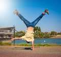 Sergey Pustovoyt. Man dancing yellow shirt blue jeans Royalty Free Stock Photo