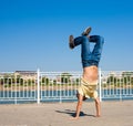 Sergey Pustovoyt. Man dancing yellow shirt blue jeans Royalty Free Stock Photo