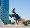 Sergey Pustovoyt. Man dancing yellow shirt blue jeans Royalty Free Stock Photo