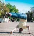 Sergey Pustovoyt. Man dancing yellow shirt blue jeans Royalty Free Stock Photo