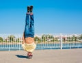 Sergey Pustovoyt. Man dancing yellow shirt blue jeans sunglasses Royalty Free Stock Photo