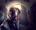 Serial maniac in hockey mask at torture chamber Royalty Free Stock Photo