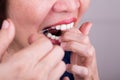 Series of Asian woman flossing teeth with oral floss Royalty Free Stock Photo