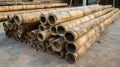A series of bamboo poles stacked together representing the increased use of fastgrowing and renewable material in the Royalty Free Stock Photo