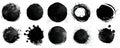 A series of black ink splatters and circles on a white background. Each has a unique texture and pattern Royalty Free Stock Photo