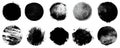 A series of black ink splatters and circles on a white background. Each has a unique texture and pattern Royalty Free Stock Photo