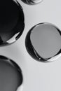 Series of black and silver spheres are arranged in a row Royalty Free Stock Photo