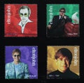 Portraits of Elton John on a series of stamps