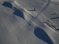 a series of hills in a row on a downhill ski course. children and adults race Royalty Free Stock Photo