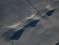 a series of hills in a row on a downhill ski course. children and adults race Royalty Free Stock Photo