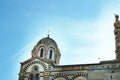 A series of 8 photos - a trace in the sky from the plane flying over Notre Dame de La garde Cathedral in Marseille, the Symbol of Royalty Free Stock Photo