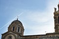 A series of 8 photos - a trace in the sky from the plane flying over Notre Dame de La garde Cathedral in Marseille, the Symbol of Royalty Free Stock Photo