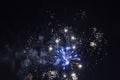 Series of real fireworks against black sky at night. Royalty Free Stock Photo